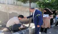 کاشت نهال به یاد دانش آموزان شهدای دانش آموز شهرستان میناب در مرکز بهداشت شهرستان اشتهارد